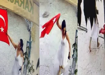 İş yerinde asılı olan Türk bayrağını çöpe attı