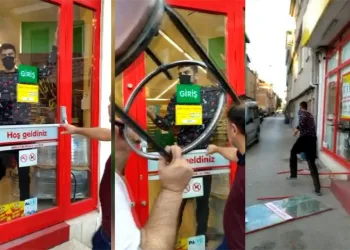 Bursa’da markete kilitlenen hırsız camı kırarak kaçtı