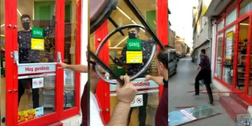 Bursa’da markete kilitlenen hırsız camı kırarak kaçtı