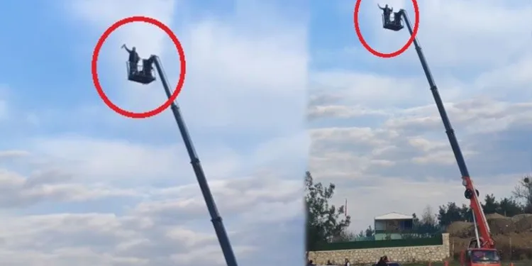 Alkollü maganda vincin tepesine çıkıp alkış istedi