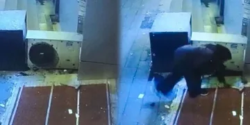 Marketin camlarını çekiç fırlatıp kırdı