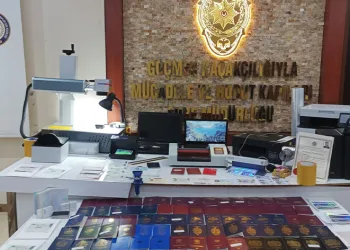 Sahte pasaport üreten şebekeye baskın