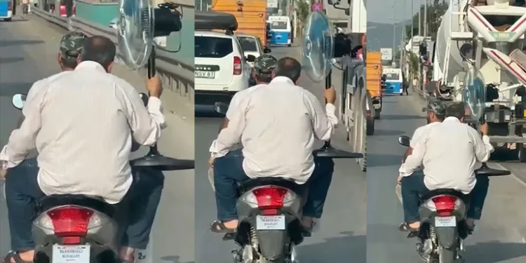Serinlemek için çareyi vantilatörde buldu