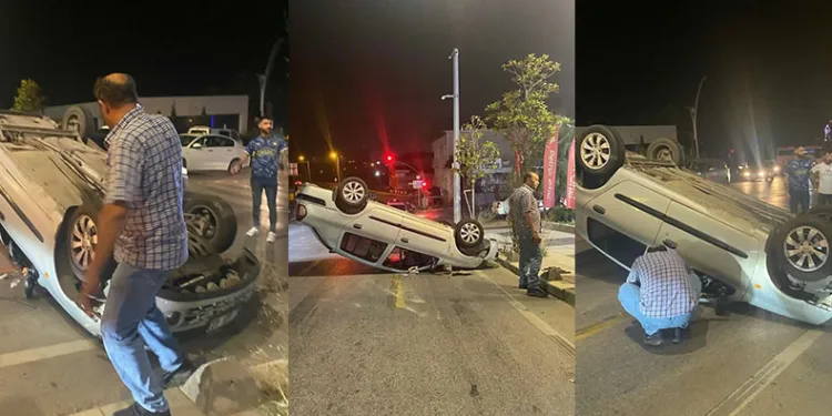 Aydınlatma direğine çarpan otomobil takla attı