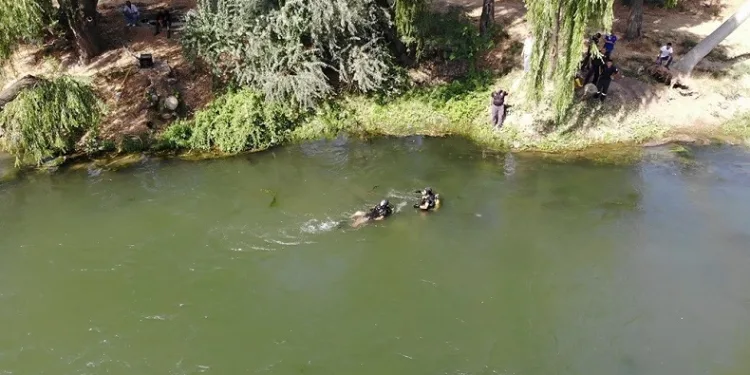 Irmağa serinlemek için giren genç boğuldu