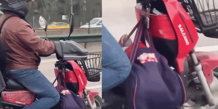 Motosikletin önüne bebeğini koyup kilometrelerce ilerledi