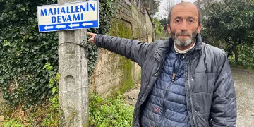 Mahallenin devamını tabelayla gösteriyor