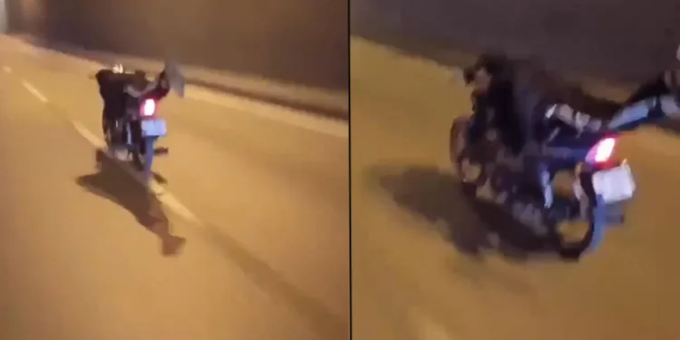 Yatarak motosiklet kullandı, ölüme meydan okudu