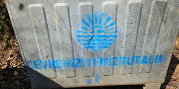 Çöp konteynerindeki yazı cesede götürdü