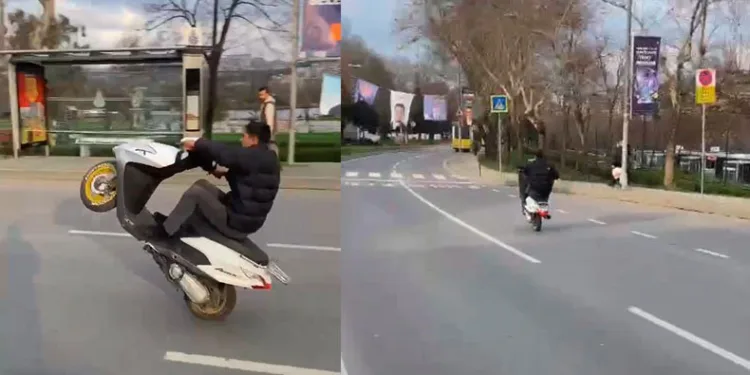 Motosikletli sürücünün tek tekerli tehlikeli yolculuğu kamerada