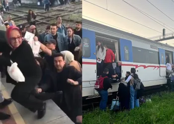 İZBAN arızalandı, yolcular raylarda yürüyerek ilerledi