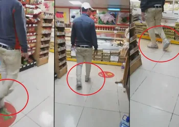 ‘Market kirlenmesin’ diye ayaklarına poşet giydi