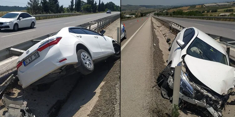 Bursa-Balıkesir karayolunda otomobil refüje çarptı: 2 yaralı