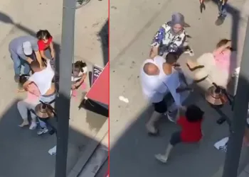 Sokak ortasında darp edilen annelerine siper oldular