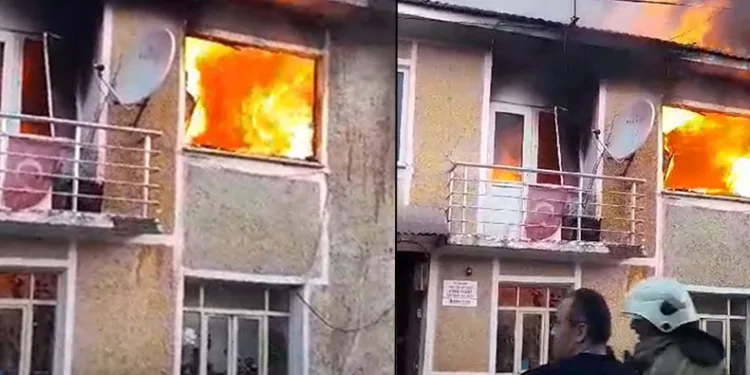Alev alev yanan evde mahsur kalan yaşlı kadını komşuları kurtardı