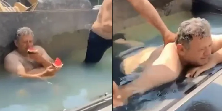 Sıcaktan bunalan işçiler, kepçeyi havuza çevirdi