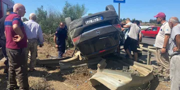 Takla atan araçta sıkıştı