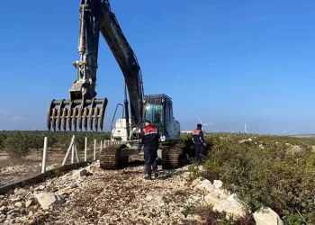 Hazine arazisinde izinsiz yer açarken yakalandı