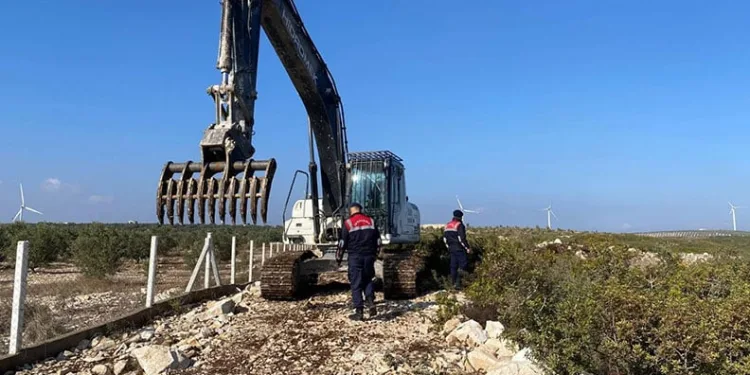 Hazine arazisinde izinsiz yer açarken yakalandı