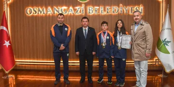 Erkan Aydın şampiyon sporcuları ağırladı