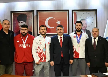 Oktay Yılmaz şampiyonları ağırladı