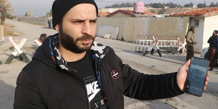 Suriye’de kışlaları gezerek rejimin el koyduğu tırını arıyor