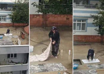 Bursa’da su kesintisine rağmen yağmur altında halı yıkadı!