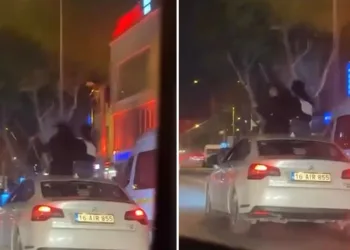 Bursa’da otomobilin tavanına oturdular : 25 bin TL ceza kesildi