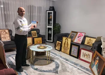 Güvenlik görevlisi çatı katını sanat atölyesine çevirdi