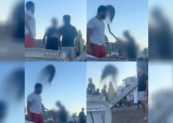 Sahilden kaldırılmak istenen gençlere kum fırlatıldı: 2 gözaltı