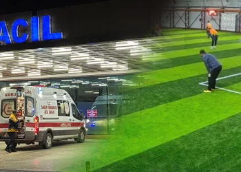 Bursa’da devrilen iş makinesinde sıkışan sürücü camdan çıkarıldı