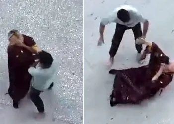 Cadde ortasında boğazını sıktığı kadını yerde sürükledi