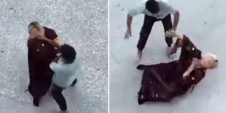 Cadde ortasında boğazını sıktığı kadını yerde sürükledi