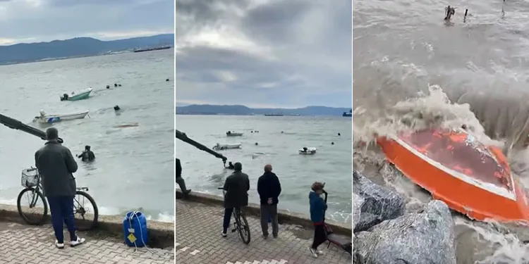 Lodosun batırdığı tekneler vinçle denizden çıkarılıyor